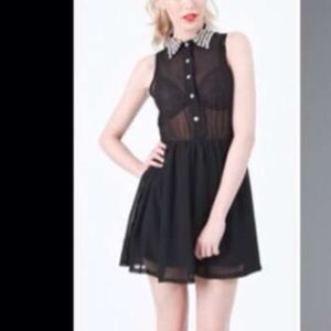 Sleeveless dress with studded collar